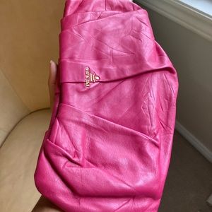 PRADA authentic pink clutch. Lambskin leather w satin interior.